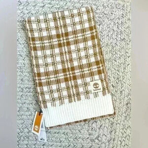 Timberland women’s plaid scarf, color is cream and golden yellow